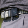 Male golfer wearing H4 GPS handheld