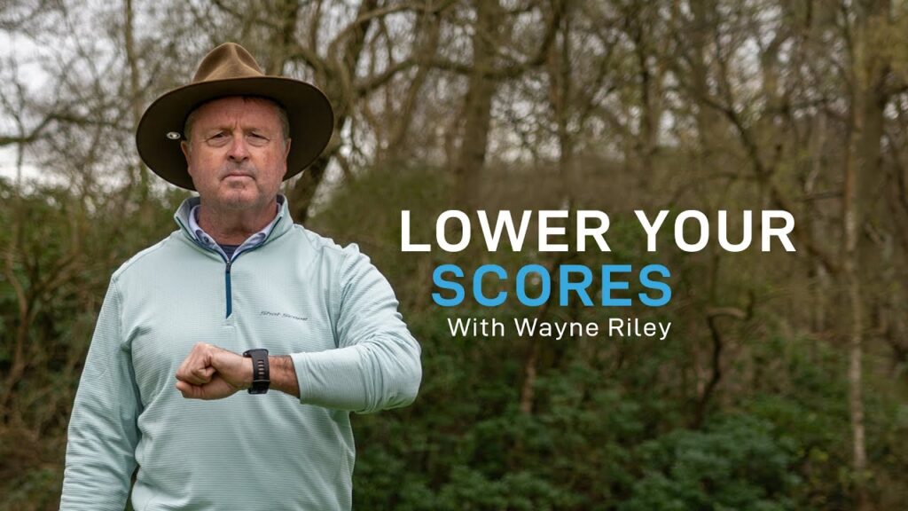 wayne radar riley standing next to text reading "lower your scores"