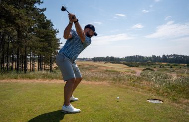 Peter Finch using driver from the tee