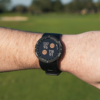 Male golfer wearing Black V5 GPS watch with hazards screen