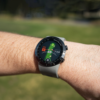 Male golfer wearing Grey X5 GPS watch with Full hole maps