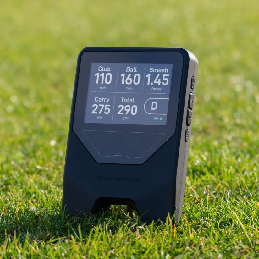 LM1 Launch Monitor on grass using portable stand