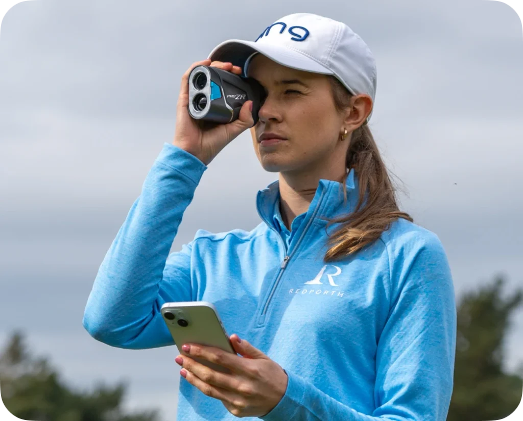 female golfer using the pro zr laser rangefinder