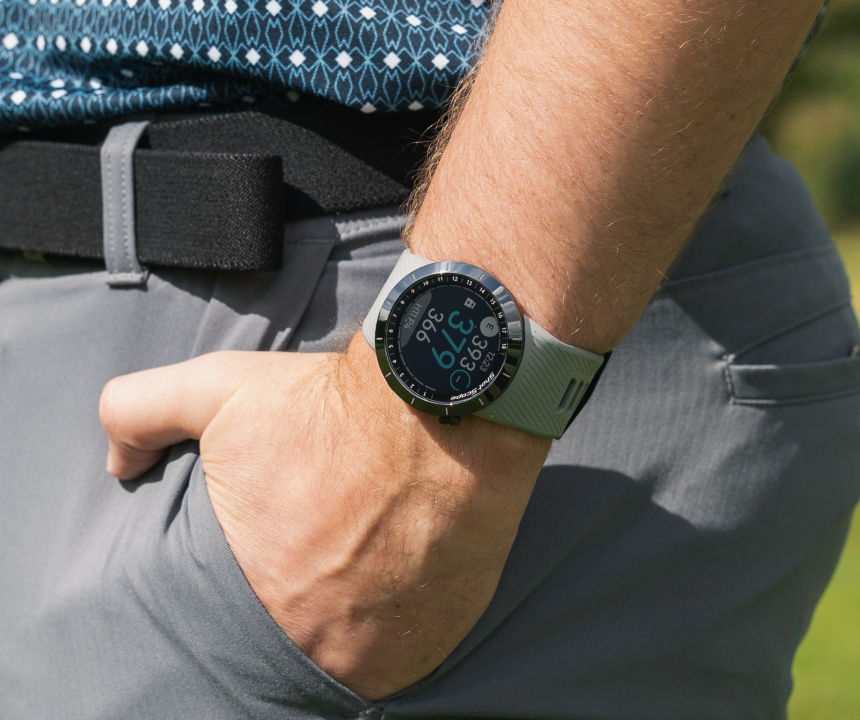 Golfer with hand in pocket and X5 on wrist