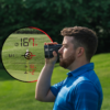 Male golfer using Grey PRO LX rangefinder, side view with rangefinder dual optics