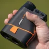 Orange 1st gen PRO LX+ in hand